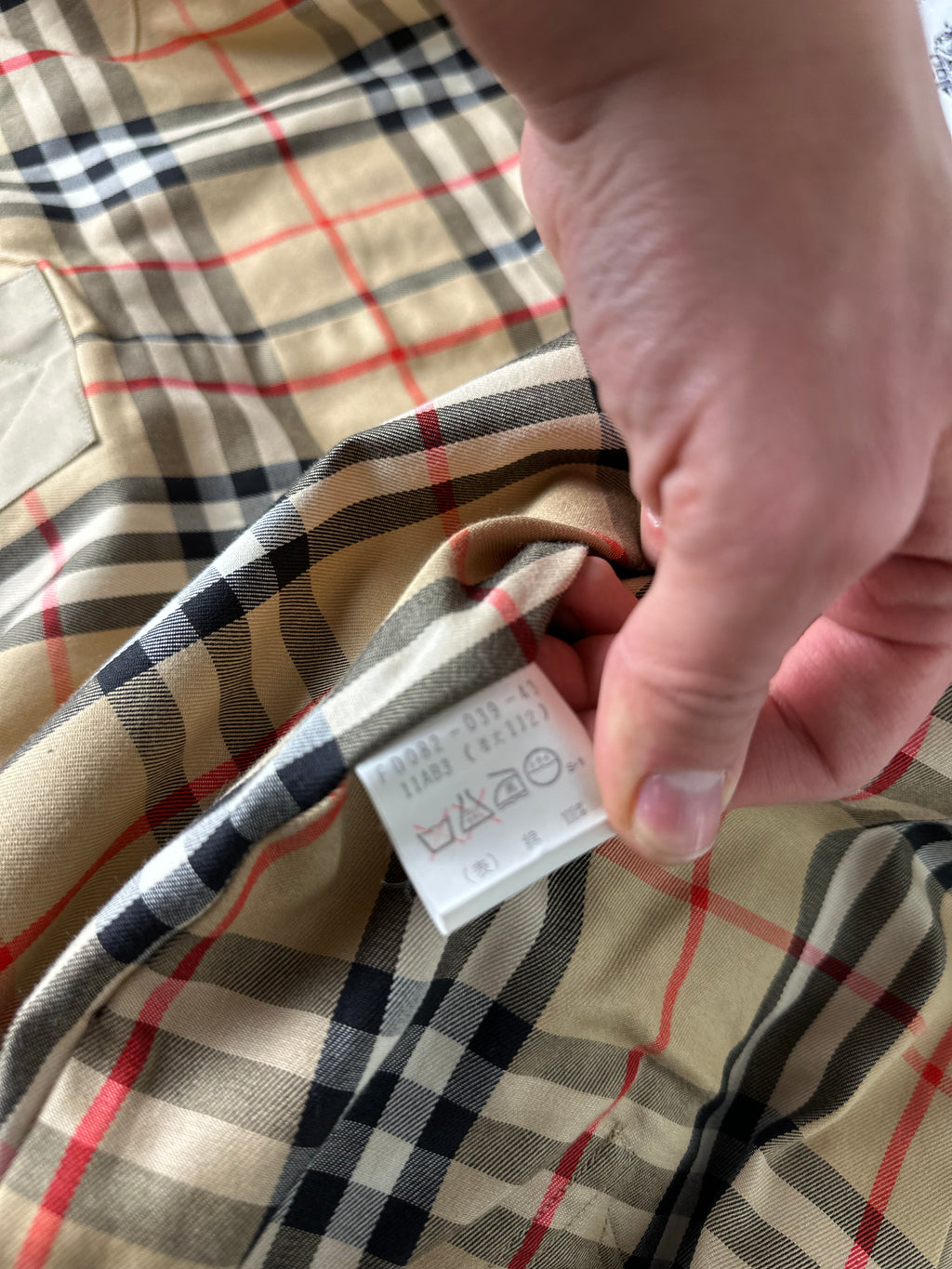 Burberrys Trenchcoat (10/S)